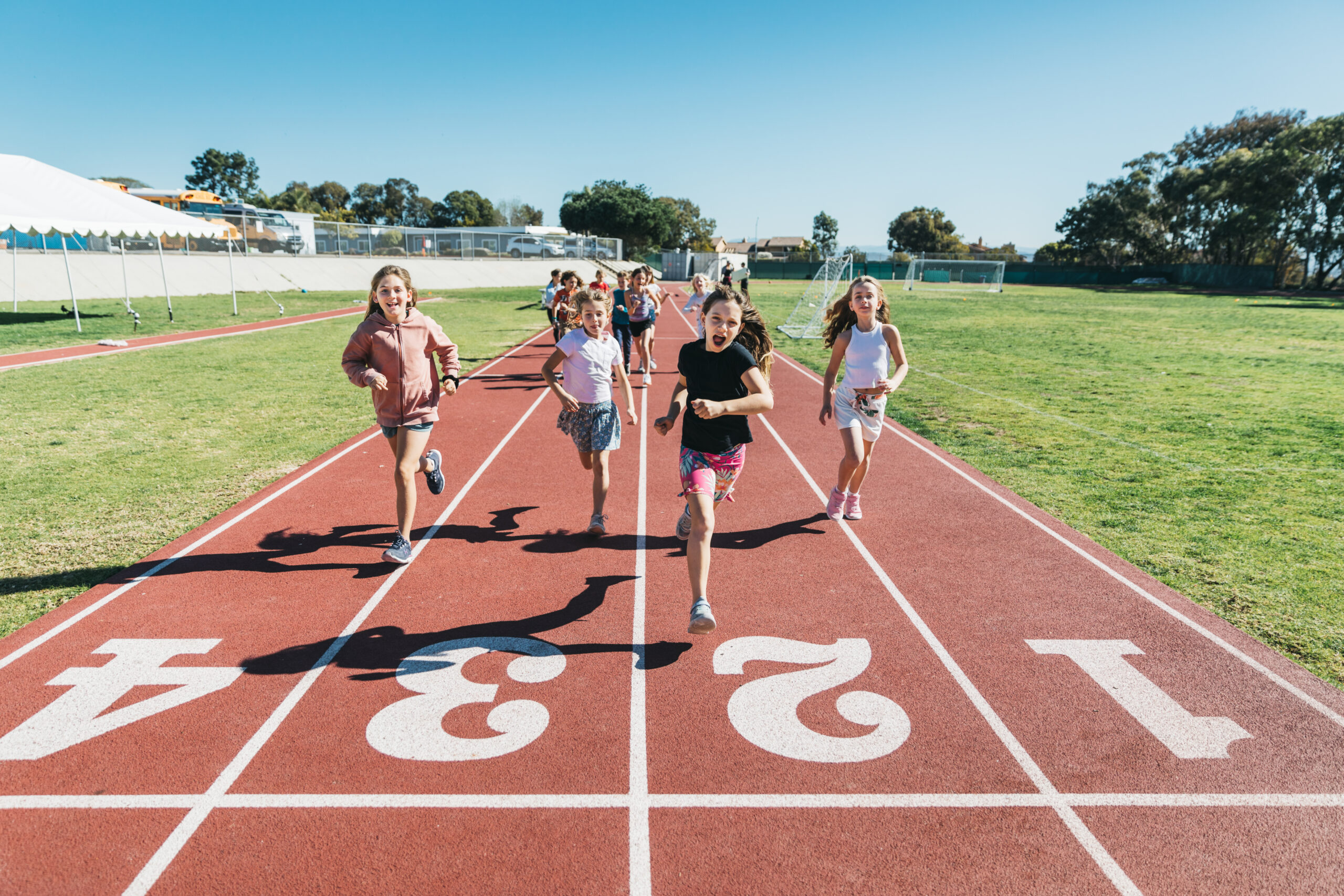 children running on a track